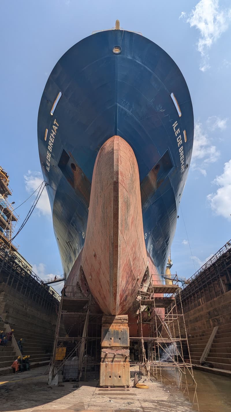 Hull and bulbous bow of a ship standing in a dry dock